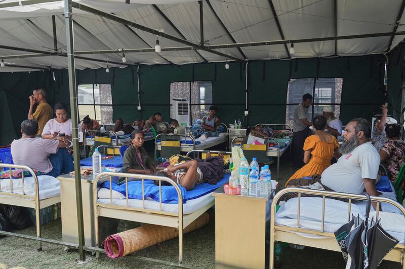 Patients in a tent opened after the March 28 earthquake in Naypyidaw, Myanmar, Friday, April 4, 2025.